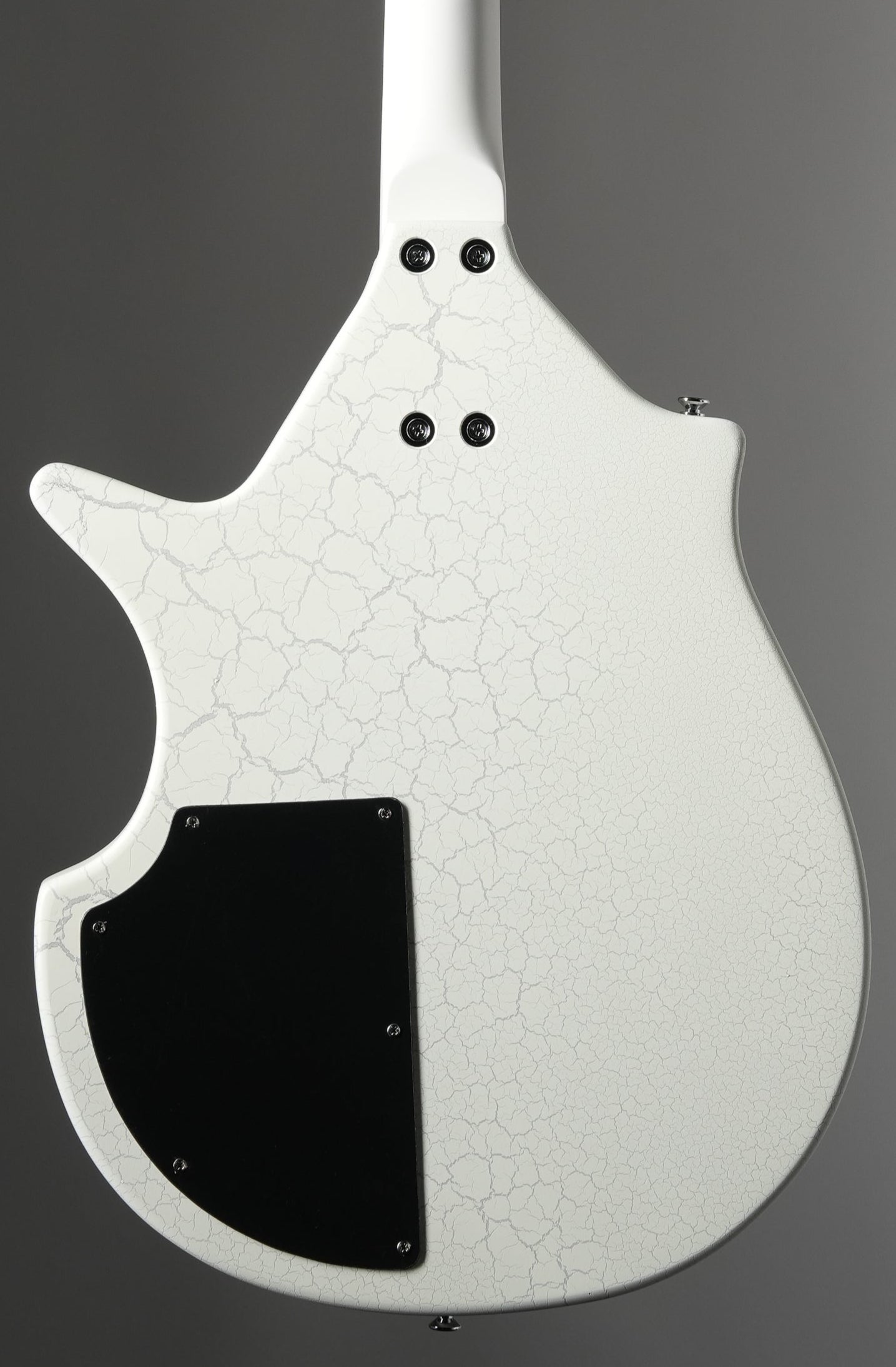 White electric guitar on a gray background